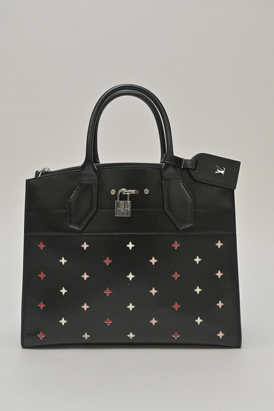 LOUIS VUITTON Black limited-edition perforated leather City Streamer bag featuring blooming motif