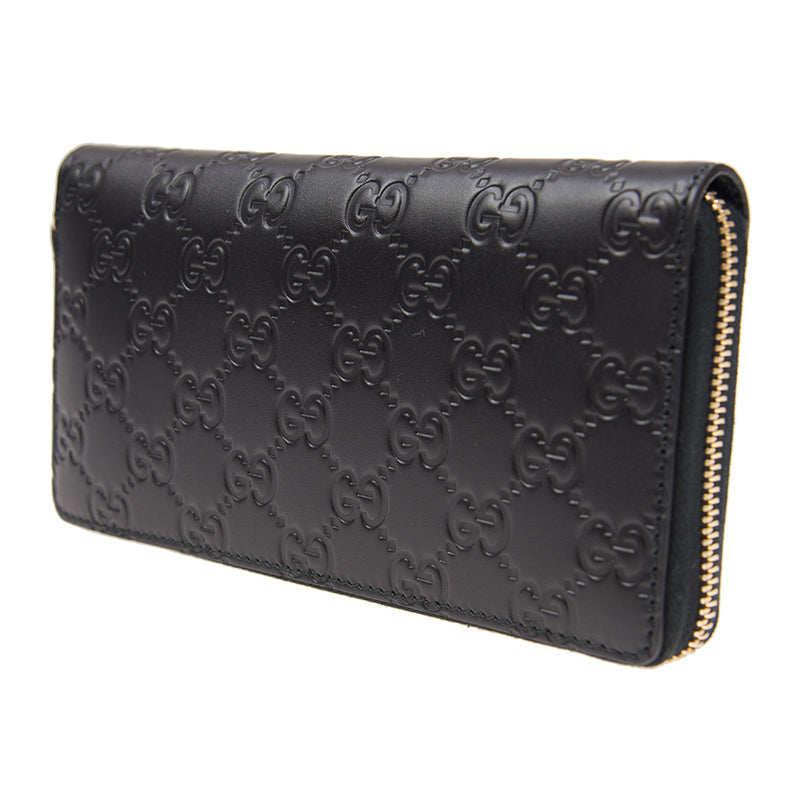 Gucci Interlocking GG Embossed Leather Zip Around Wallet in Black